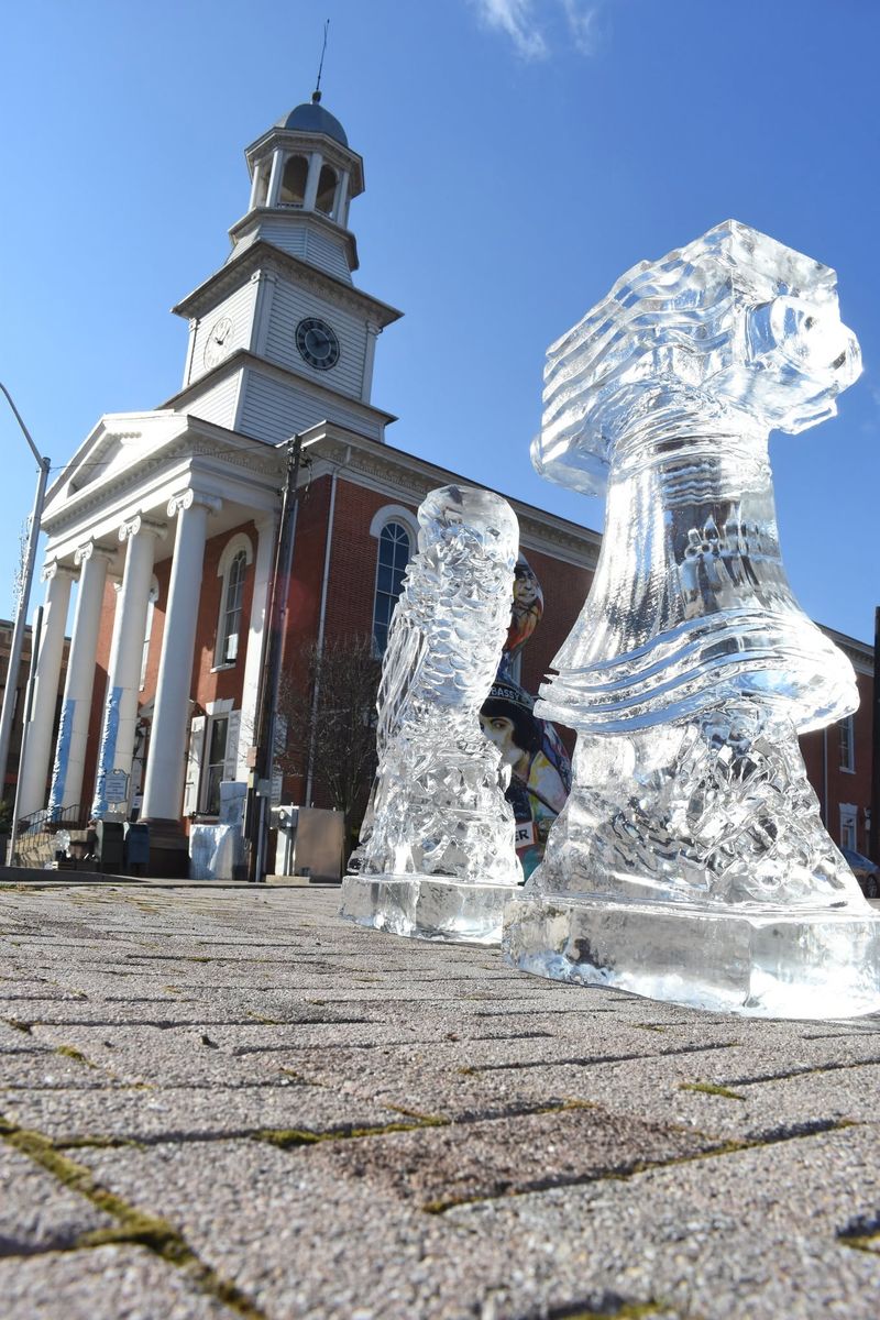 Ice sculptures on the brick sidewalk in front of the historic Mifflin County Courthouse in downtown Lewistown during the Festival of Ice
